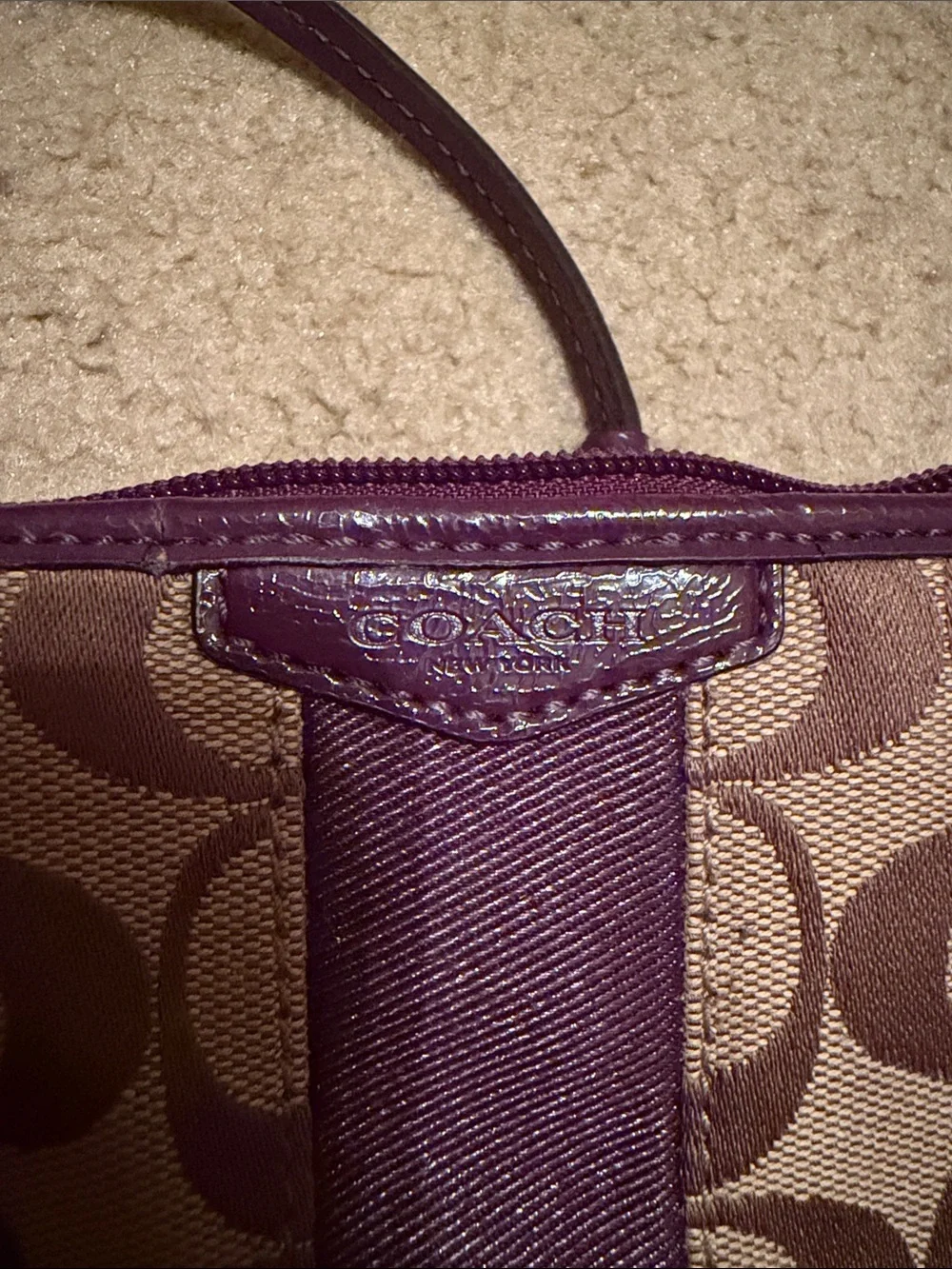 Coach Brown Signature Canvas Wristlet with Plum Trim